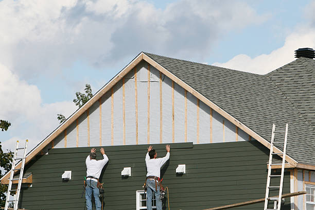 Professional Emergency Siding Repair technician working in Lucas, OH